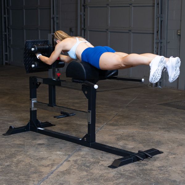 Body-Solid Glute and Ham Machine, Black Finish SGH500B Female User