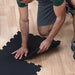 Body-Solid Rubber Flooring Installation Action Shot
