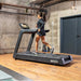 SportsArt T674L-16 Elite Treadmill female user running