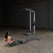 body solid lat machine glm83 woman seated row