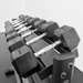 bodykore rubber hex dumbbell set 3-tier rack