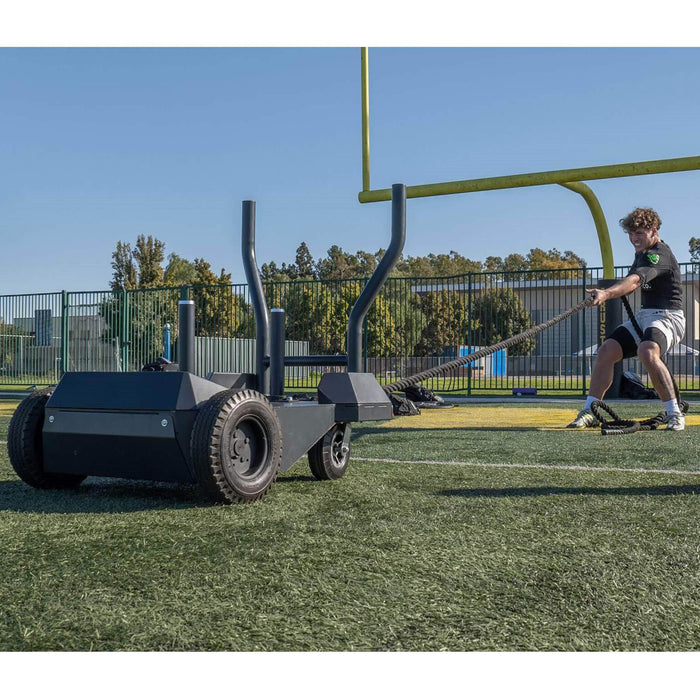 bodykore smart sled an pulling at football field