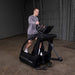 endurance e5000 premium elliptical trainer man exercise side view