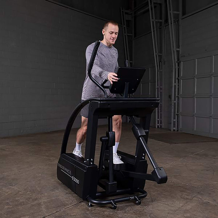 endurance premium elliptical trainer e5000 man exercise front view