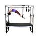 Female User of Align Pilates Cadillac Trapeze Table